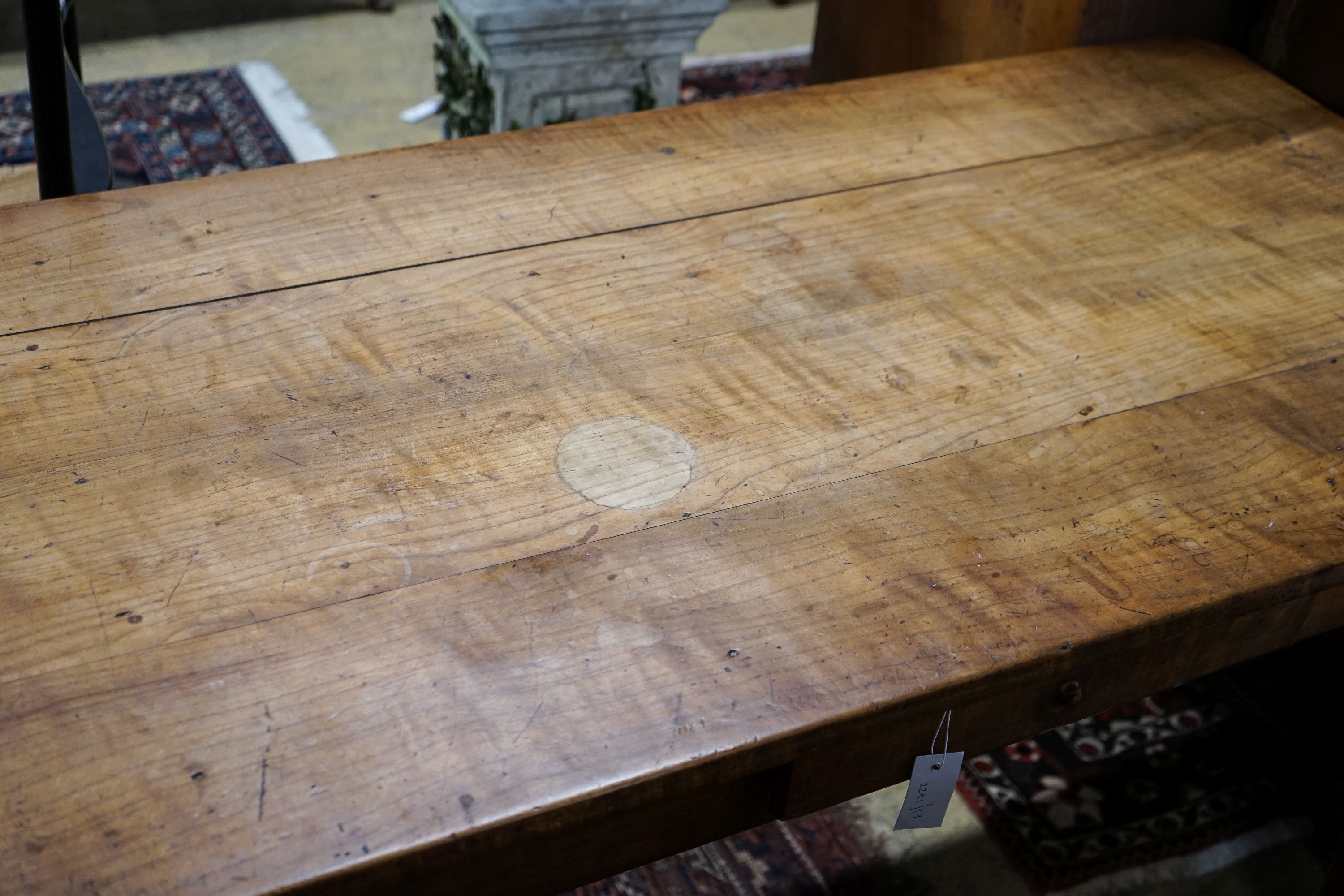 A 19th century French fruitwood and cherry farmhouse side table, width 130cm, depth 69cm, height 76cm